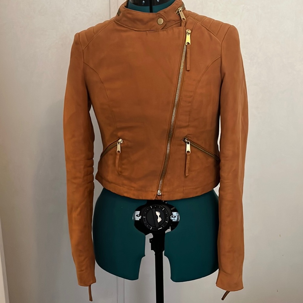 Faux Suede Moto Jacket. Really cute. Little wear and tear. Size Two H&M brand